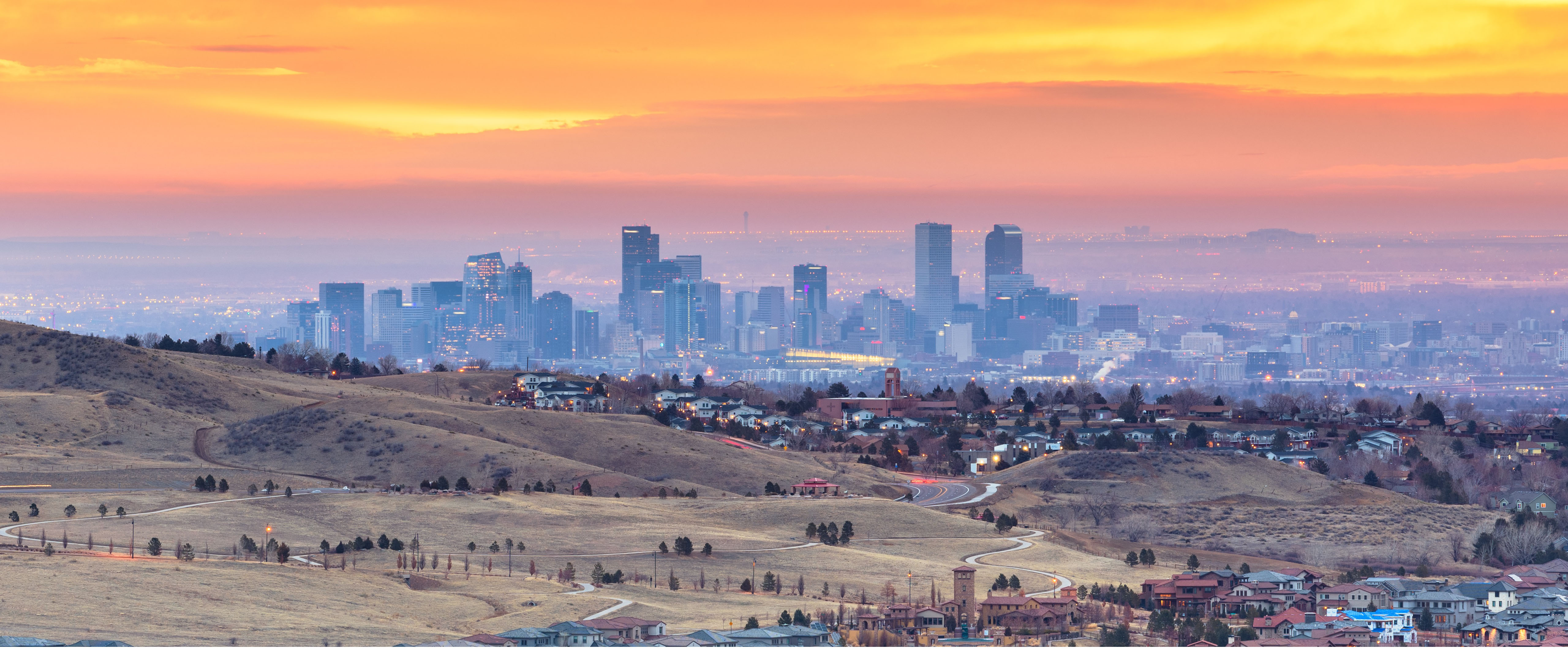 a sunset view of the Denver skyline